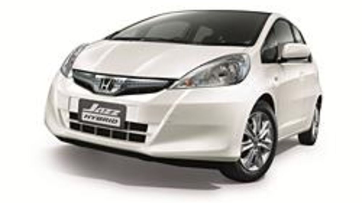 Обзор гибридов. Хонда джаз 2012 гибрид. Honda Jazz Hybrid 2007. Хонда Аква гибрид. Хонда гибрид 2х местная.